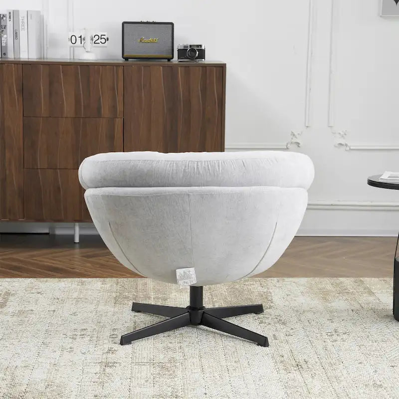Draaibare clubfauteuil van chenille met zwart metalen onderstel
